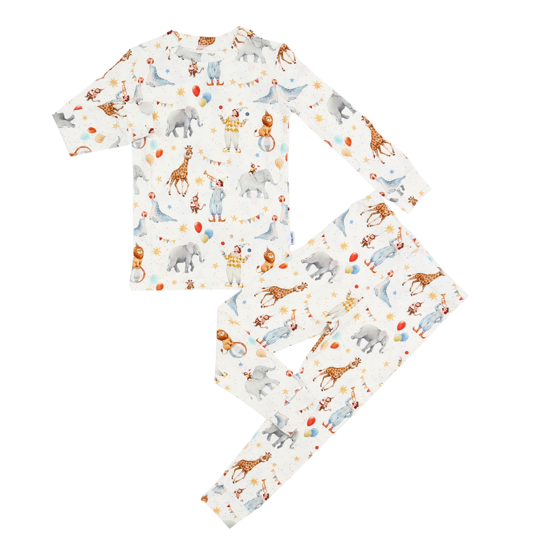 Children's pajama set with animal pattern on a white background