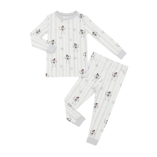 A two-piece children's pajama set featuring a long-sleeve top and matching pants, laid flat on a white background. The pajamas have a white and light gray vertical stripe pattern with small cartoon dog illustrations and light gray cuffs.