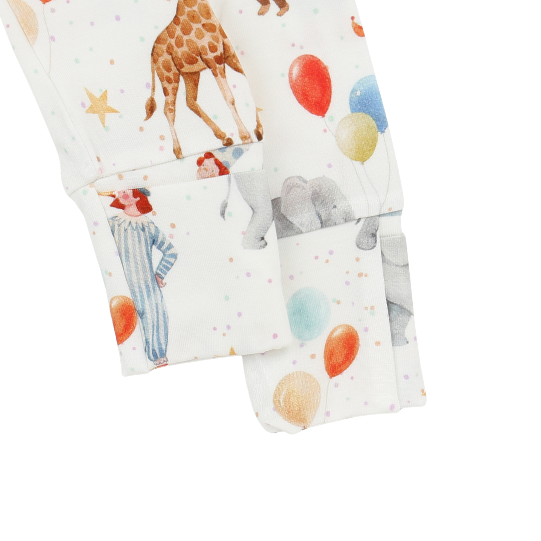 Baby blanket with animal and balloon pattern on a white background