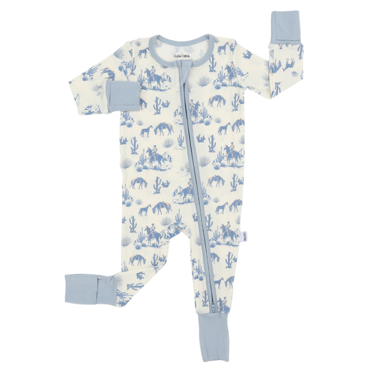 Baby onesie with blue desert pattern on a white background