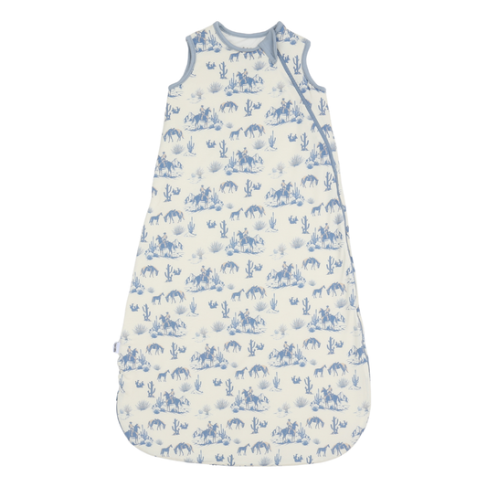 Baby sleeping bag with blue animal pattern on a white background