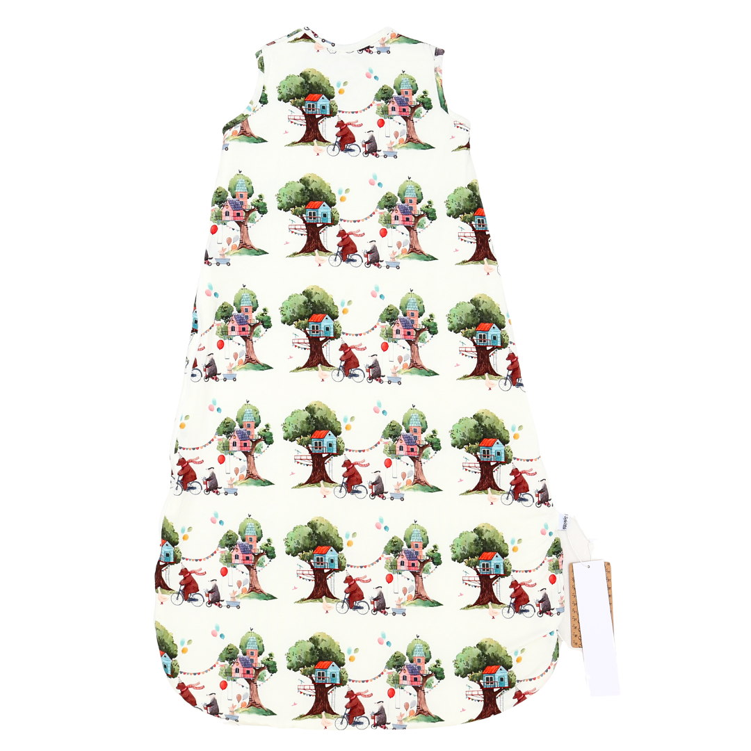 Dress with treehouse pattern on a white background