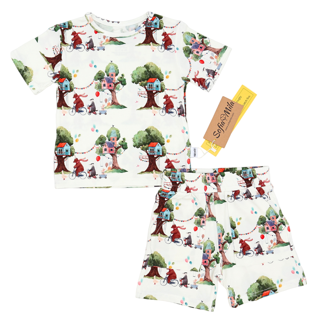 Children's t-shirt and shorts set with treehouse pattern on a white background