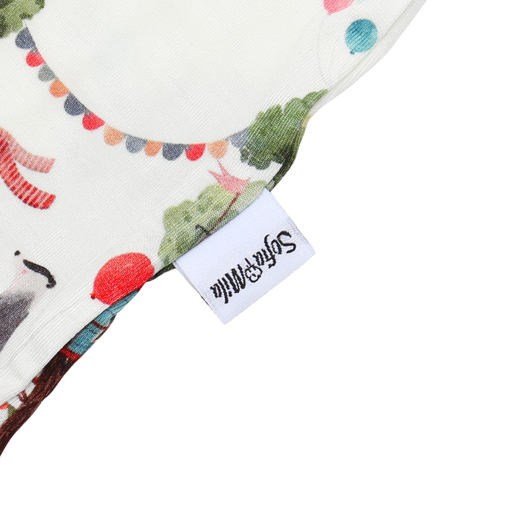 Product with a colorful design featuring animals and bunting, branded 'Soylent'.