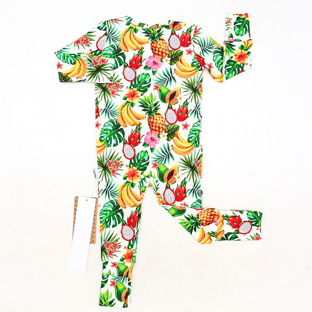 Tropical fruit-themed outfit with shirt and pants on a white background