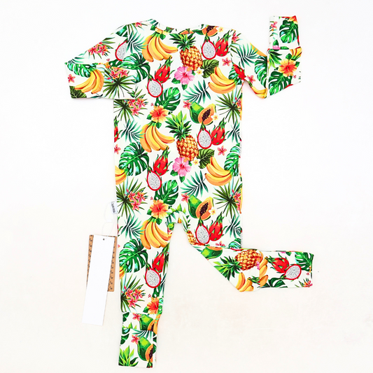 Tropical fruit-themed outfit with shirt and pants on a white background