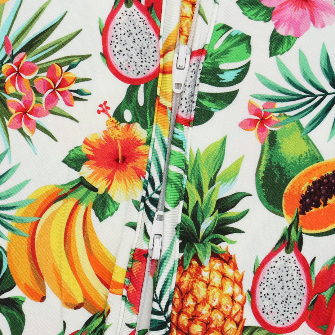Tropical fruit and floral pattern on a white background