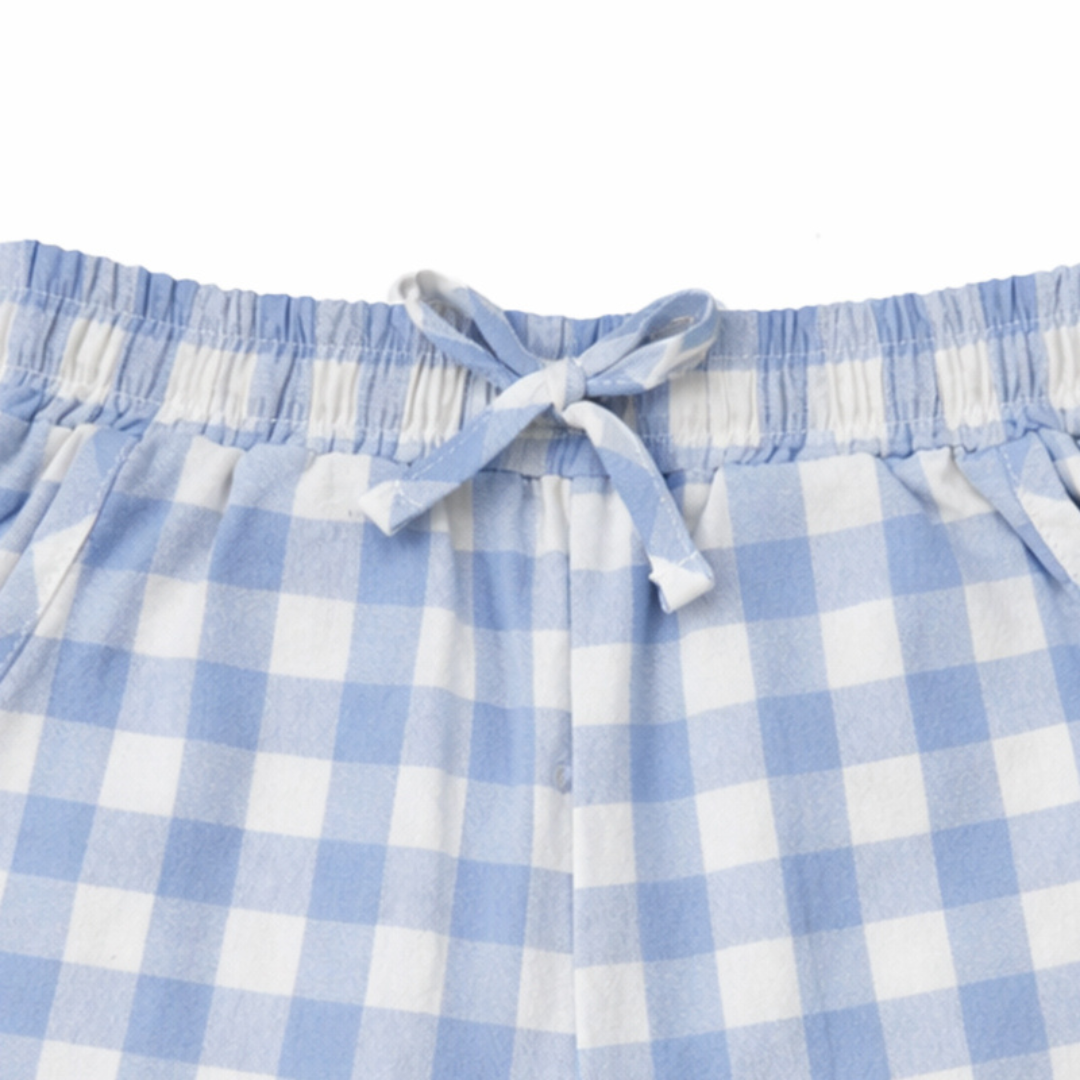 Blue and white checkered shorts with a tie waist on a white background