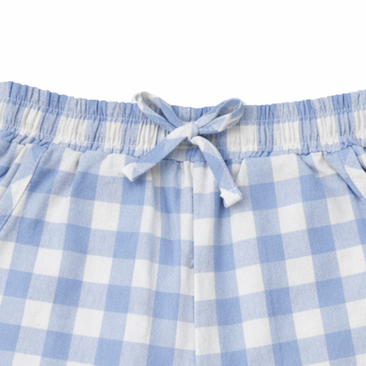 Blue and white checkered shorts with a tie waist on a white background