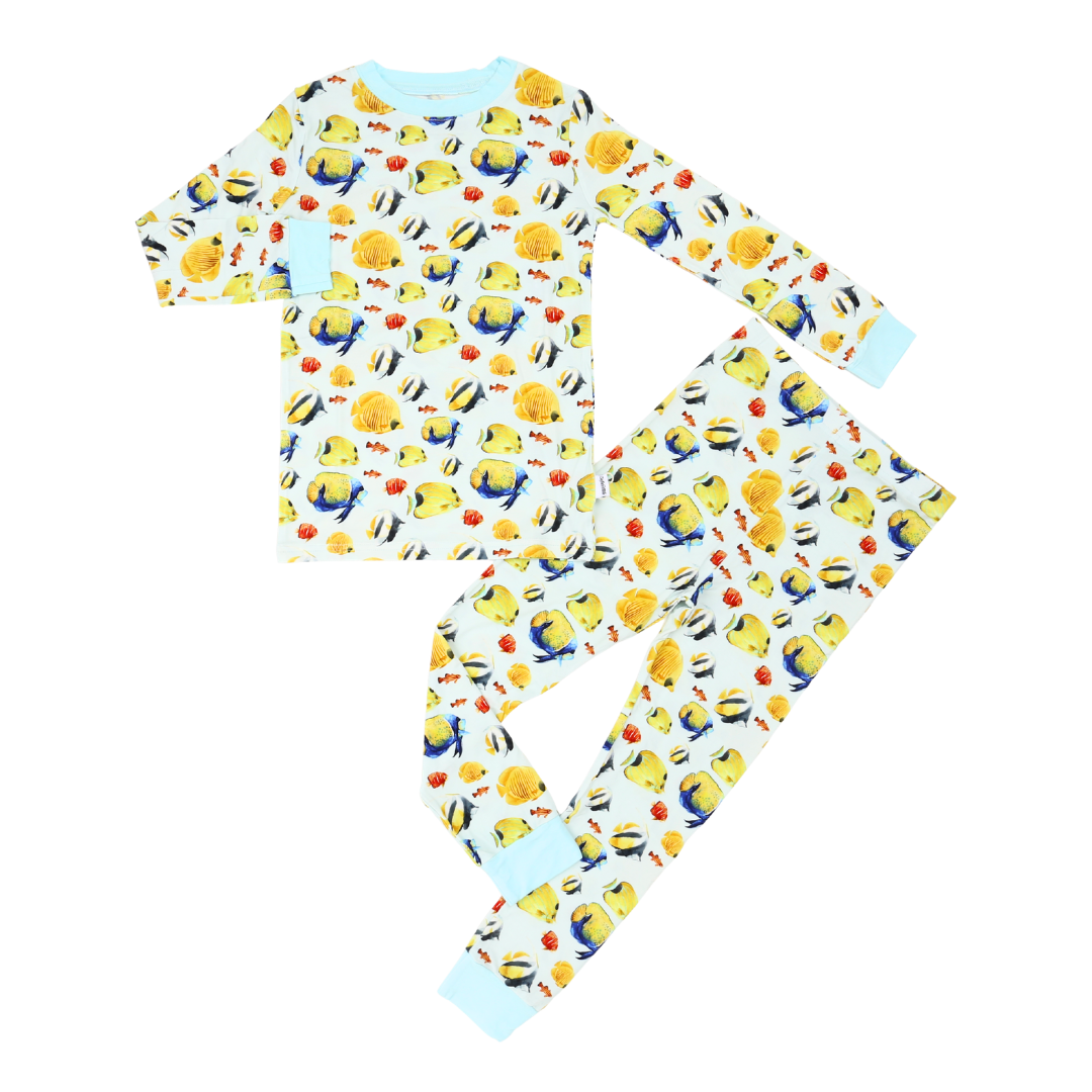 Children's pajama set with cartoon character pattern on a white background