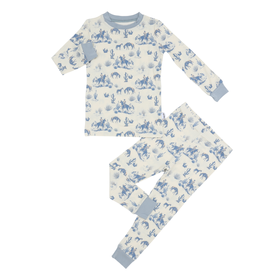 Children's pajama set with blue animal pattern on a white background