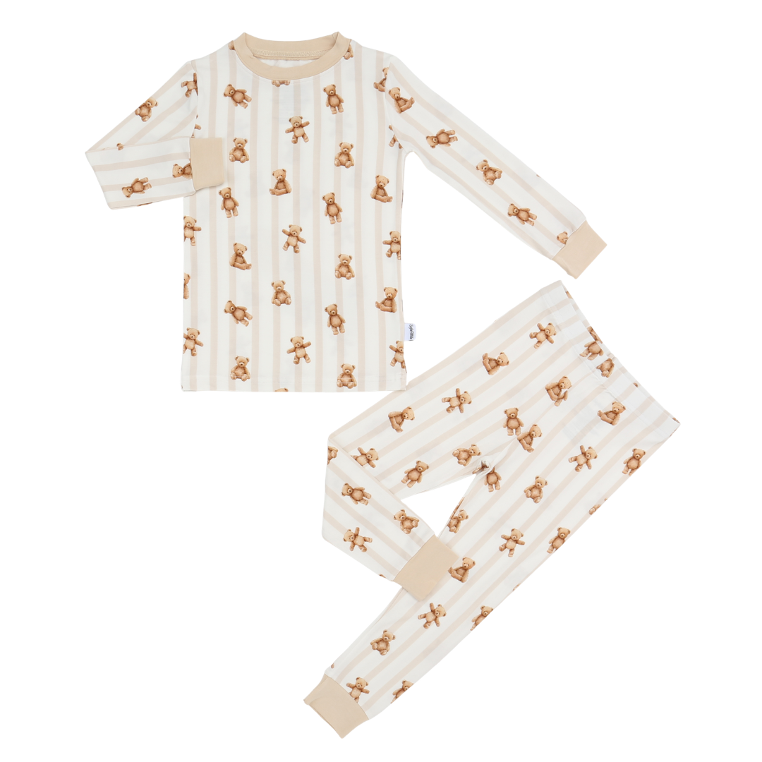 Children's pajama set with teddy bear pattern on a white background