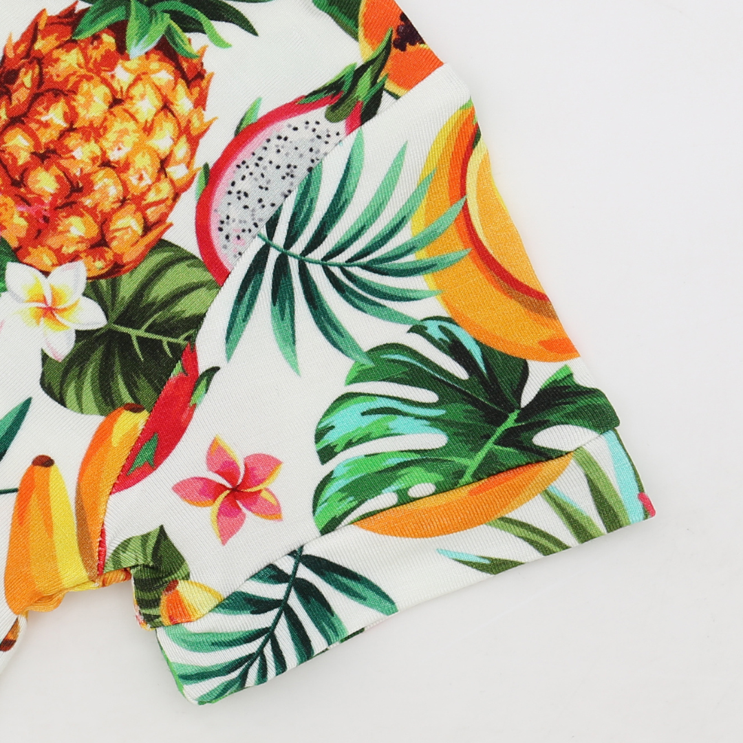 Tropical fruit and leaf pattern on a white background