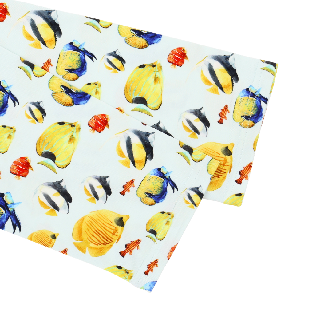 Fabric with colorful fish pattern on a white background