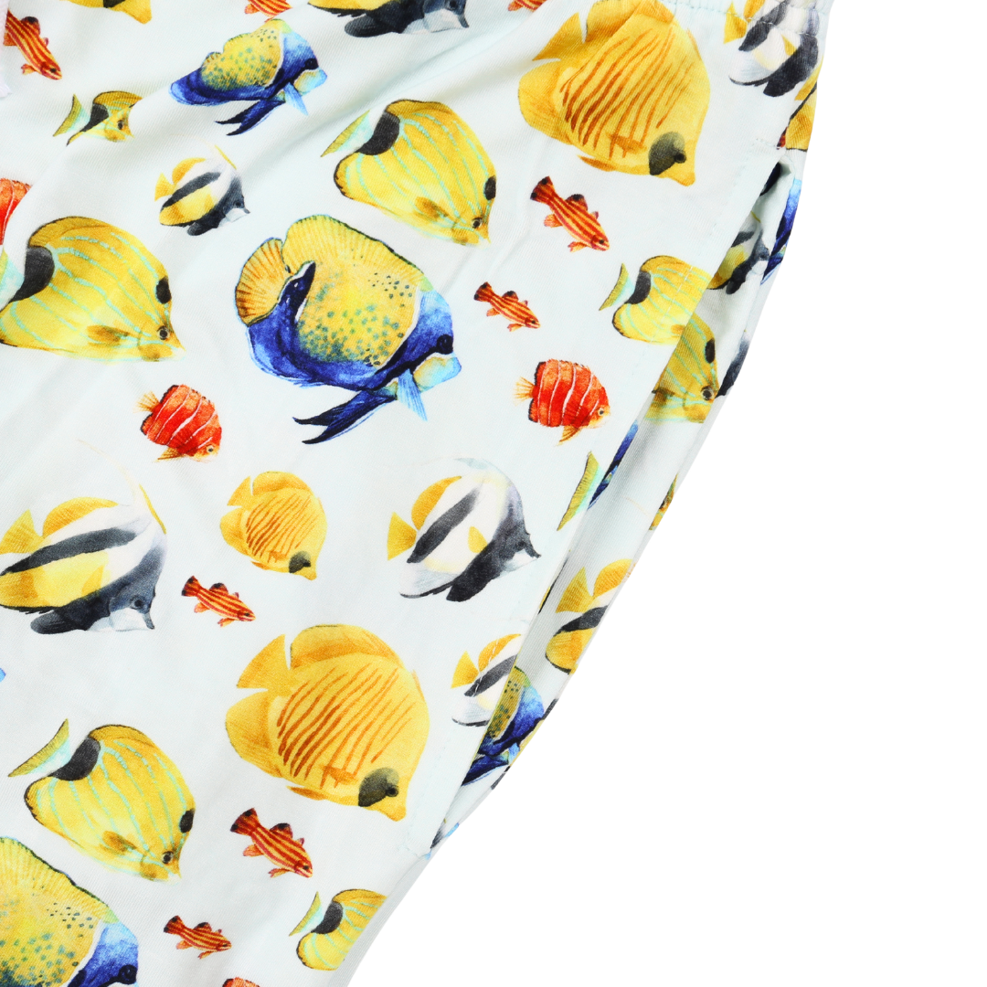 Fabric with colorful fish pattern on a white background