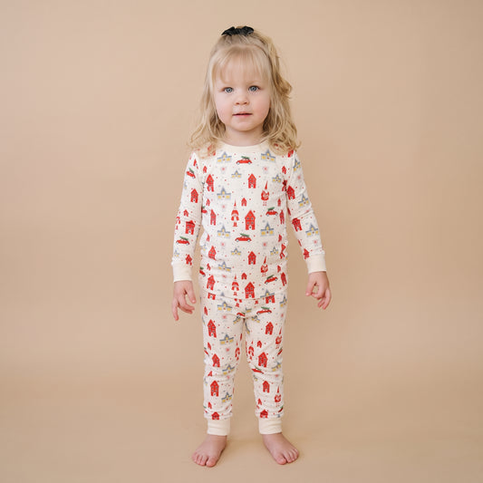 Girl wearing Christmas bamboo pajamas for toddlers