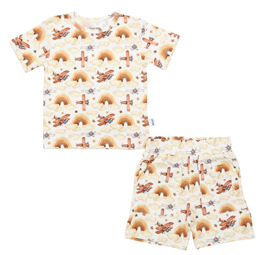 T-shirt and shorts set with rainbow and cloud pattern on a white background