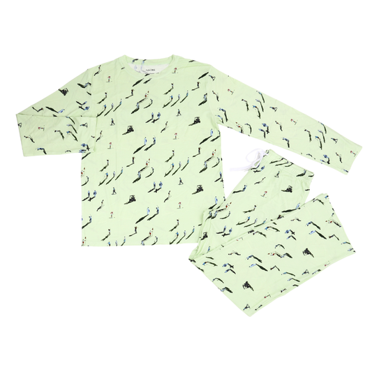 Light green pajama set with small black print on a white background