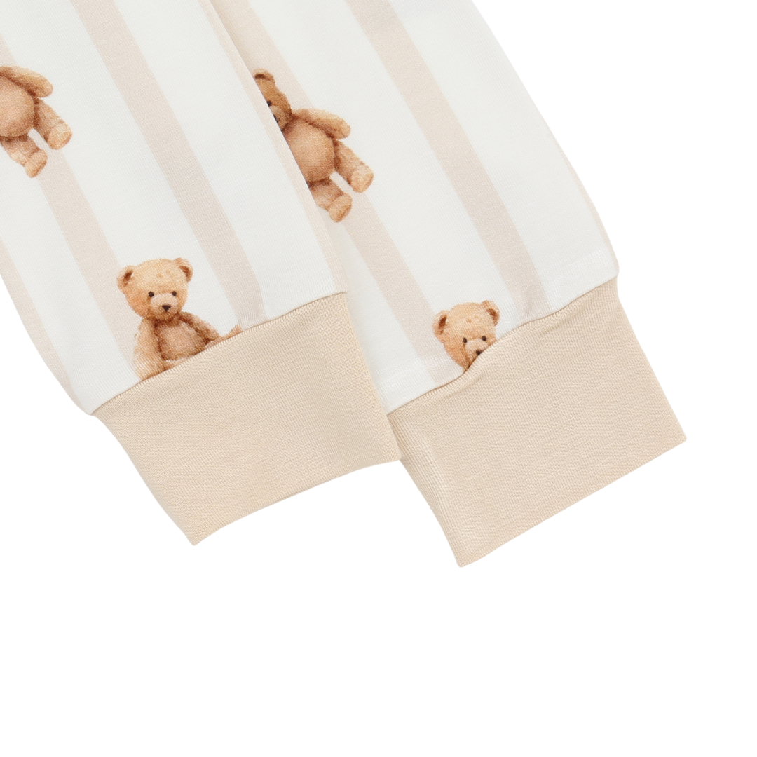 Pair of pants with teddy bear pattern on a white background