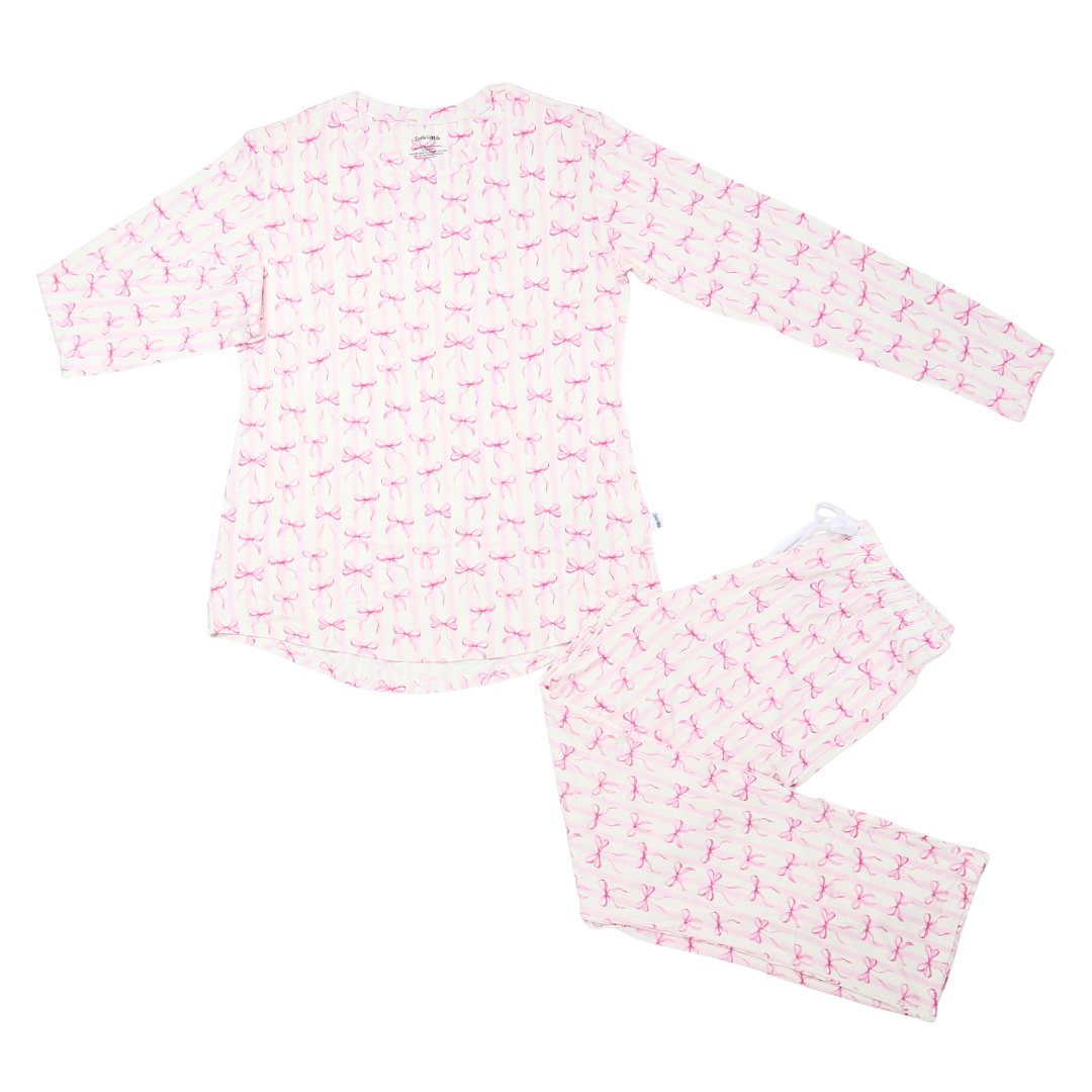 Pink and white pajama set with a pattern on a white background