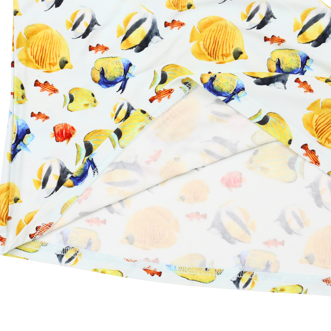 Sheet with colorful fish pattern on a white background