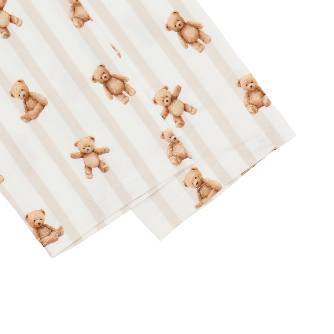 Fabric with teddy bear pattern on a white background